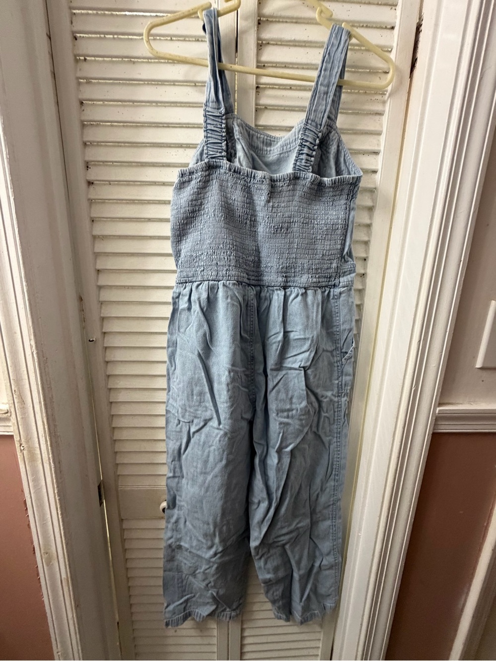 Light blue denim junpsuit.